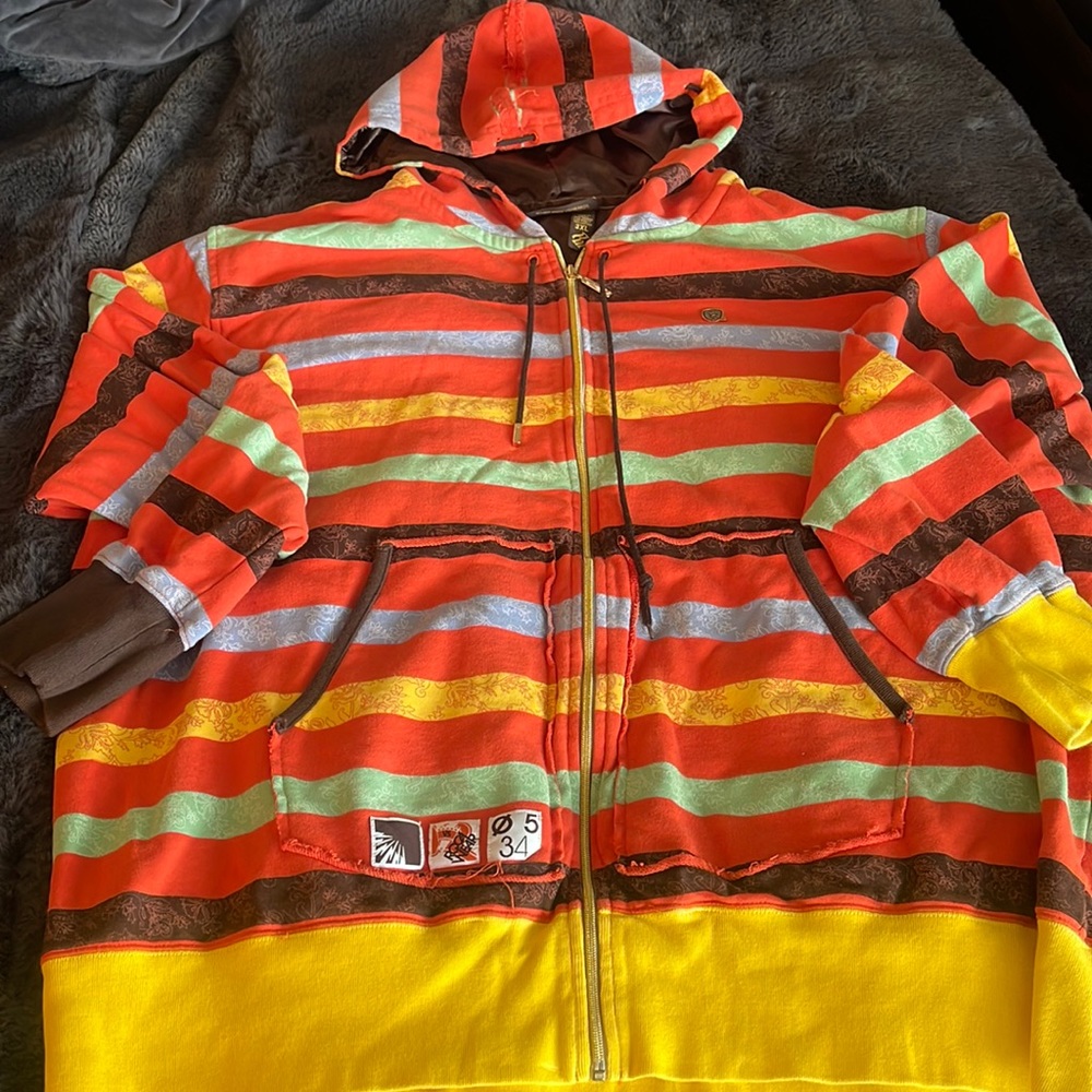 Rocawear men’s size 3XL multi color zip up hoodie jacket.